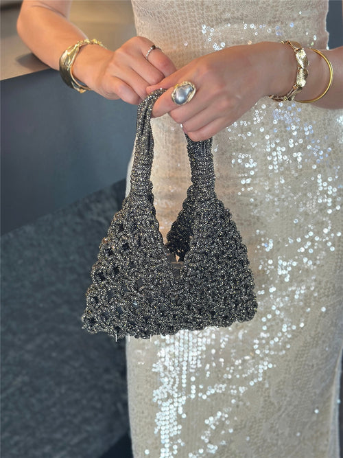 Sparkling rhinestone wine tote bag held by woman in sequin dress, perfect for luxury gifts and celebrations