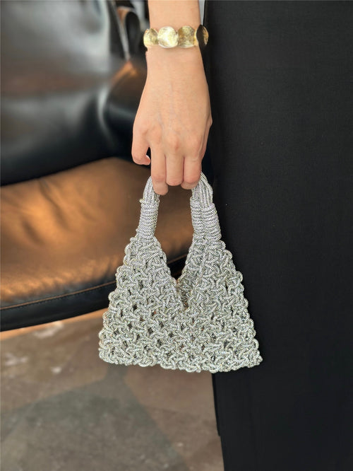 Sparkling rhinestone wine tote bag held by hand, perfect for luxury wine gifts and celebrations.