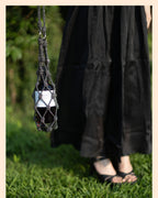 Sparkling rhinestone wine tote bag holding a bottle, perfect for luxury wine gifts and parties.