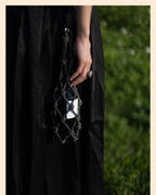 Elegant rhinestone wine tote bag holding a bottle, perfect for luxury wine gifts and celebrations.