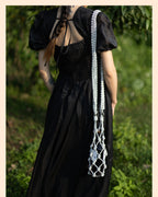 Sparkling rhinestone wine tote bag carried by woman in black dress, perfect for weddings and parties