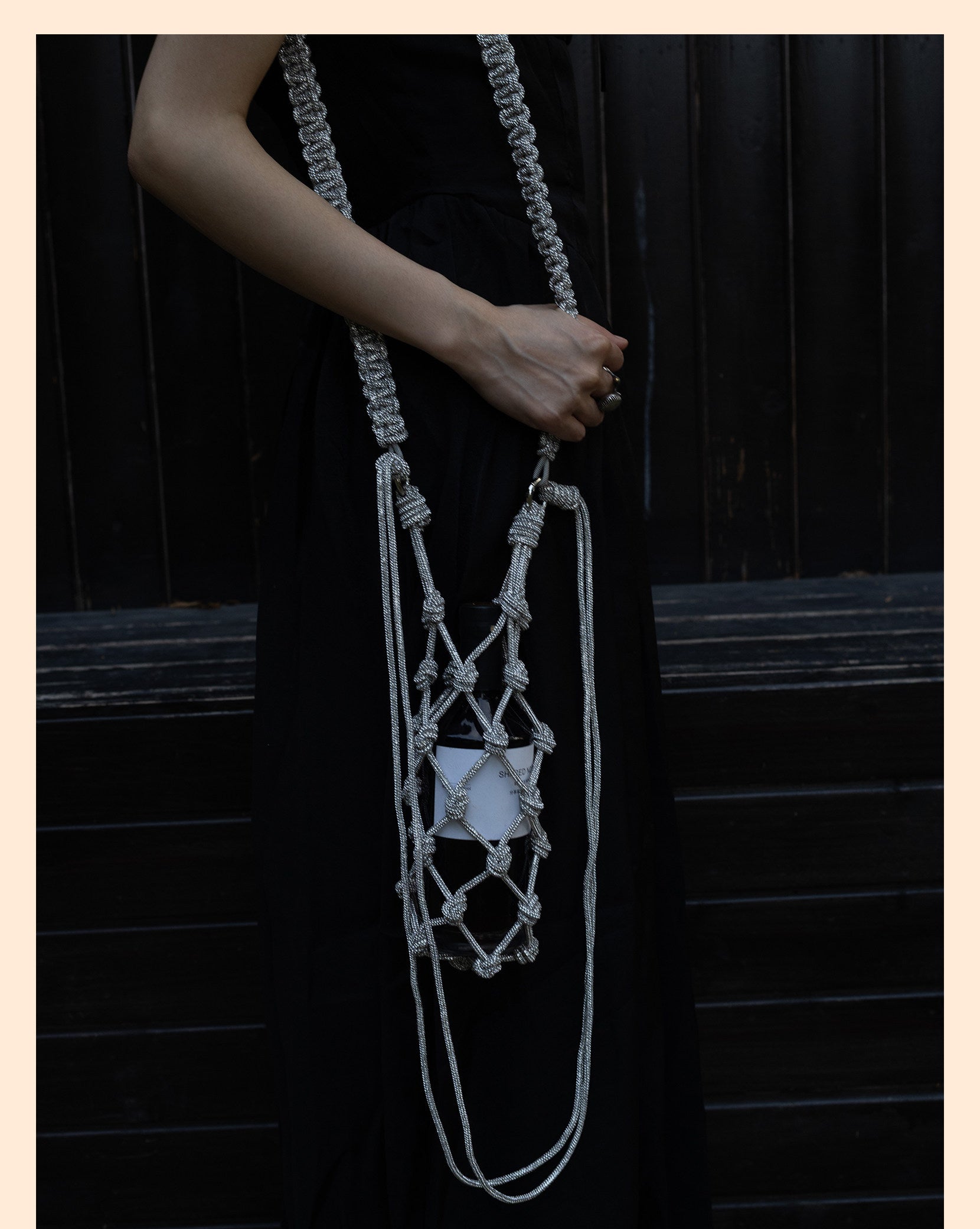 Sparkling rhinestone wine tote bag with knotted design, perfect for luxury wine gifts and elegant events.