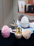 Sparkling rhinestone egg-shaped wine accessories with gold and silver cutlery, perfect for luxury gifts and celebrations.