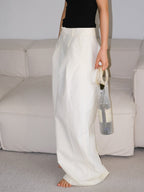 Sparkling rhinestone wine tote bag with clear handle, held by woman in white pants, perfect for parties.