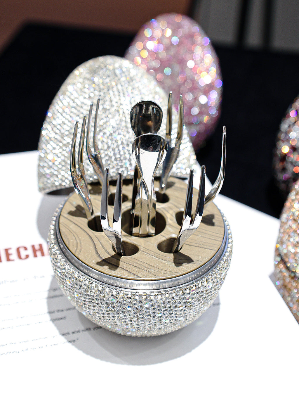 Luxury rhinestone wine accessory set with silver forks and spoons in a crystal-embellished holder