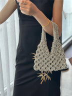 Elegant rhinestone wine tote bag with gold leaf detail, perfect for luxury wine gifts and celebrations.