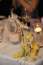 Sparkling rhinestone wine tote with lemon garnish, perfect for weddings and parties