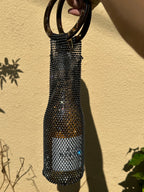 Rhinestone wine tote bag with tortoiseshell handles, perfect for luxury wine gifts and celebrations.